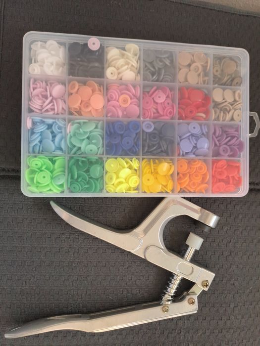 Caixa de molas multicor, mais o aplicador das mesmas