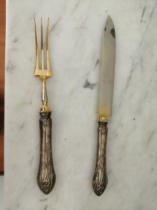 Talheres vintage com cabo em prata.