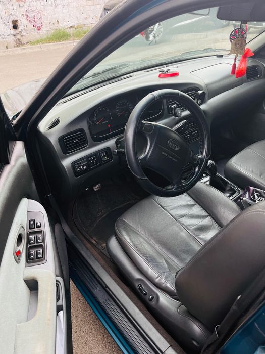 Kia Clarus 1998, 2.0  газ/бензин