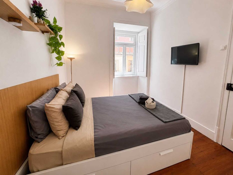 Quarto no coração de Arroios