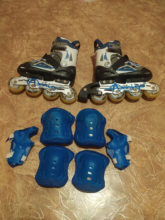 Роликовые коньки