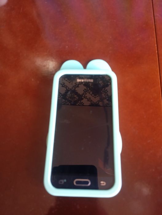Телефон Samsung J120