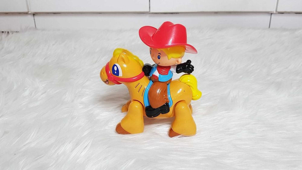 Dumel Discovery galopujący kowboj na koniu zabawka z dźwiękiem muzyką