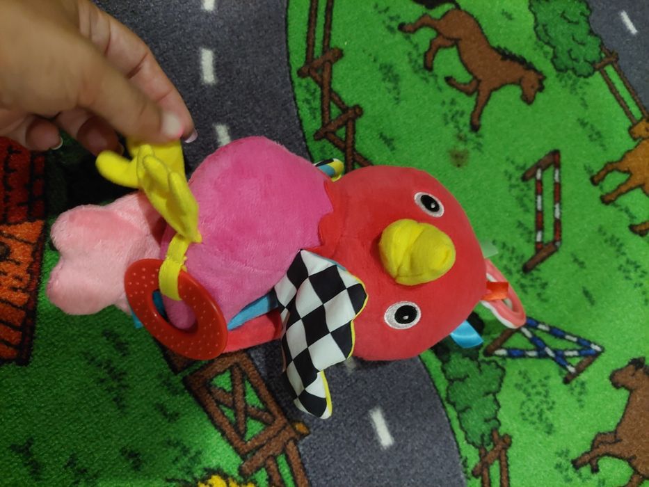 Іграшка на коляску