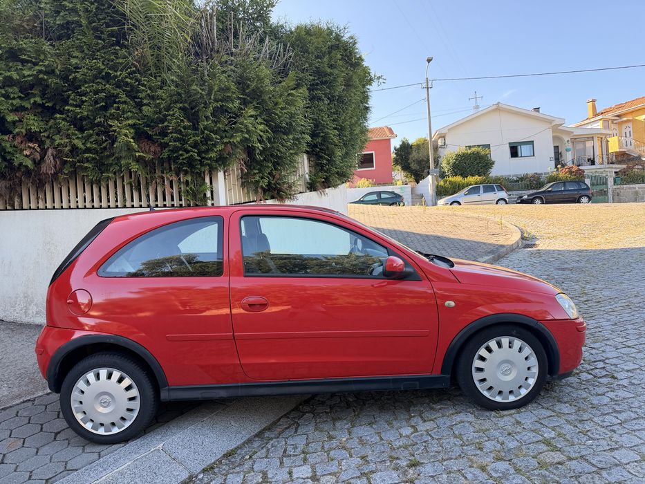 Opel corsa  5L 2006 1.0 sport full extras impecável