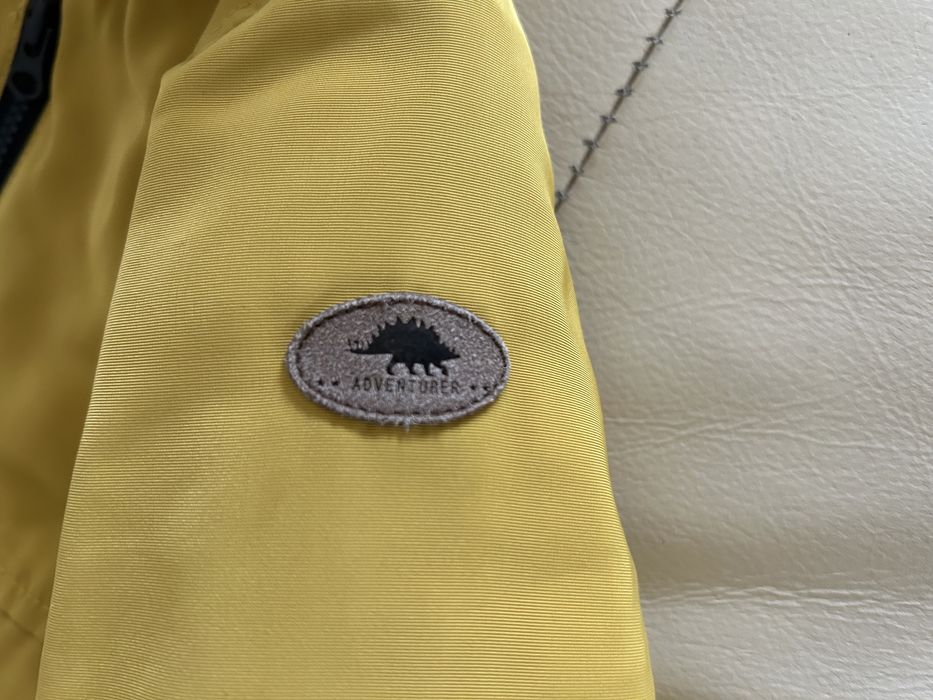 Zimowa, ochrowa kurtka ze sztucznym futrem marki Next