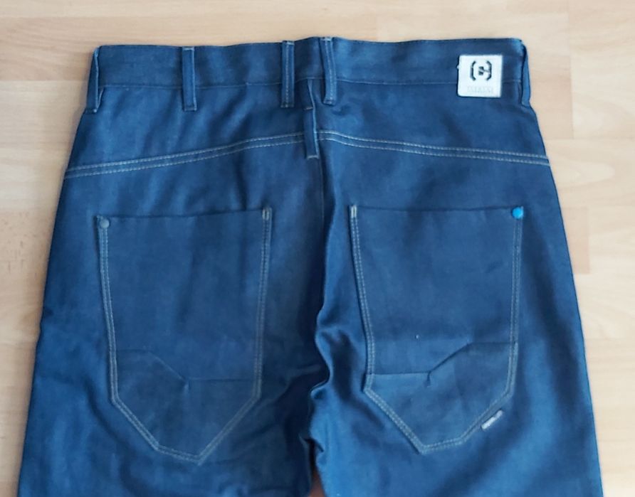 Nowe jeansowe spodnie męskie CROPP W30 L32