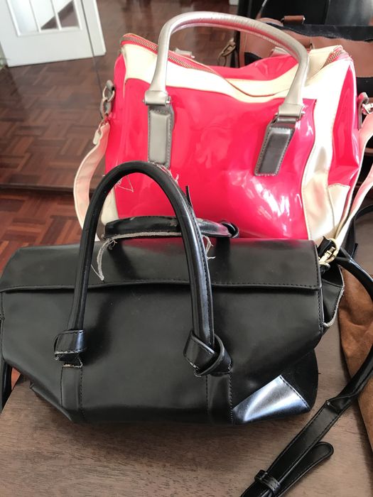 Várias malas, mochilas e carteiras | mulher