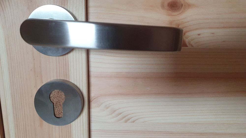 Klamka z szyldem marki HAFI