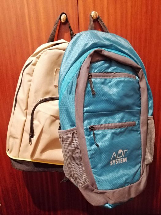 Mochilas 50x37x14 cm (com capa para chuva incluída) e 41x34x13cm