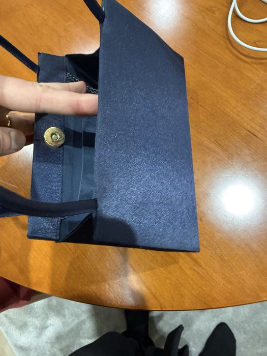 Mala cetim em estado novo