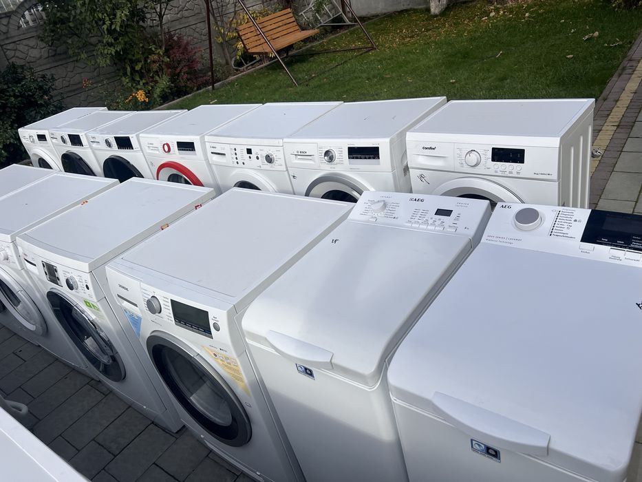 Пральна машина з сушкою. Вузька в глибину