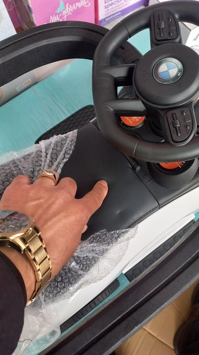 Толокар каталка гумові колеса,поворотна ручка,шкіра єко сидіння,муз.св