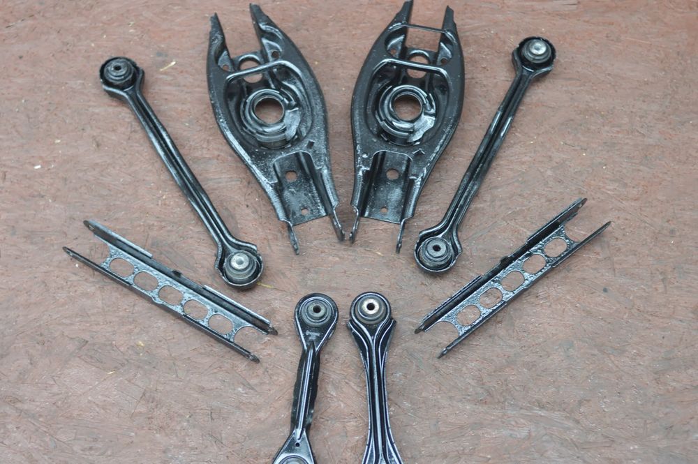 bmw e90 / e81 / e87 / e91 / e92 / e93 oryginalne wahacze tył lewe / p