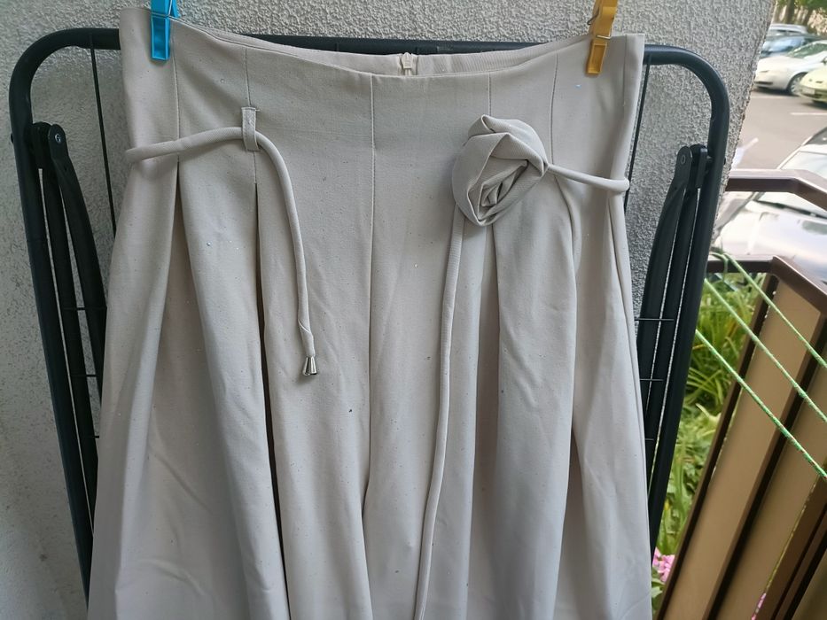 Spodnie damskie szerokie kremowe rozm L
