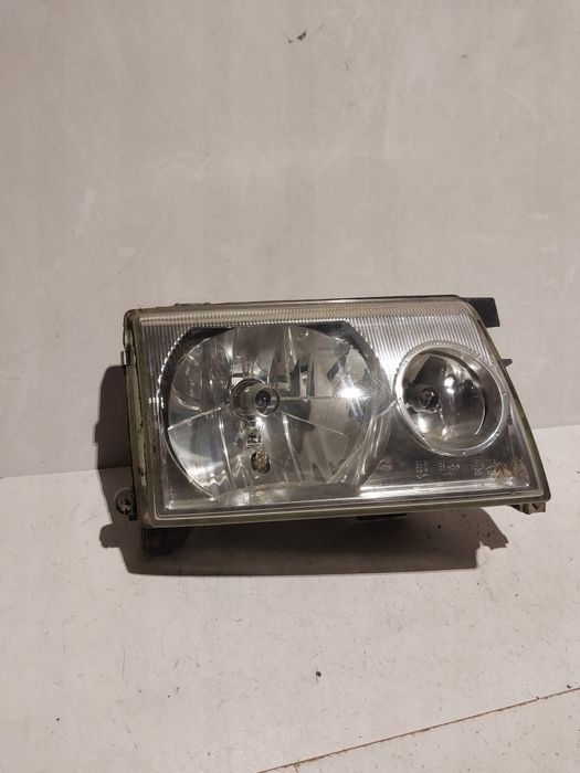 Nissan terrano II 2 lift polift prawa lampa przednia prawy reflektor
