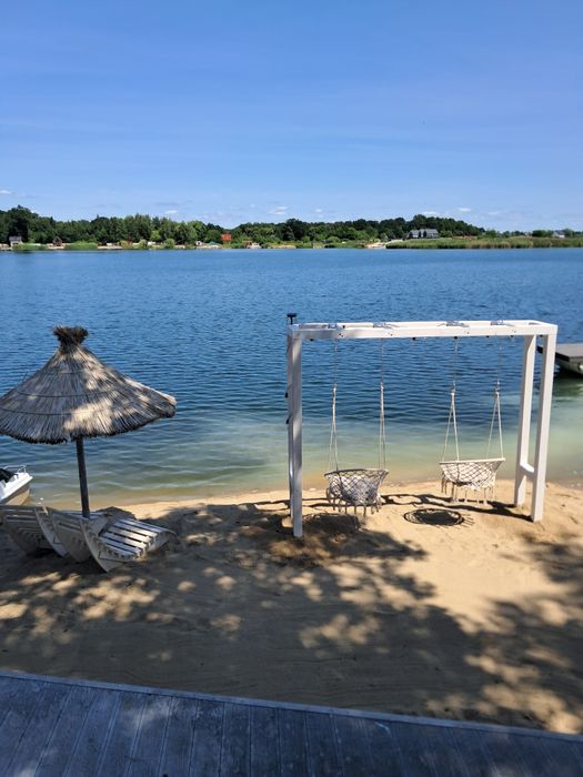 Domek nad jeziorem z własną plażą + jacuzzi