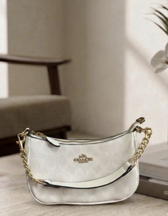 Carteira coach.