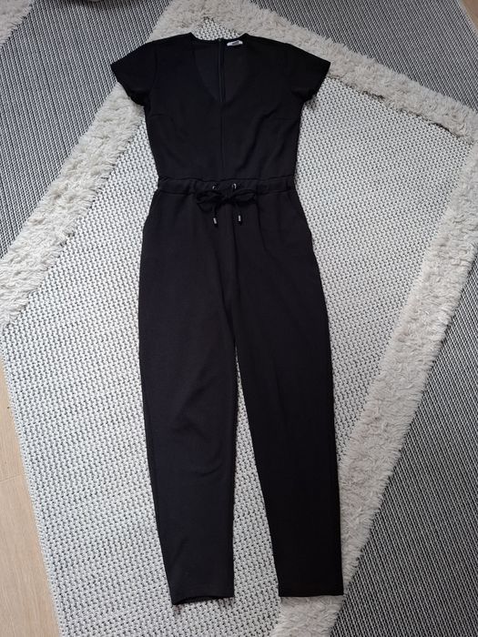 Czarny Kombinezon spodnium Amisu New Yorker r. M - L, 38 - 40