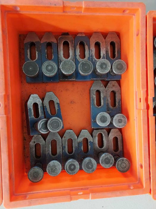 Calços de aperto para moldes