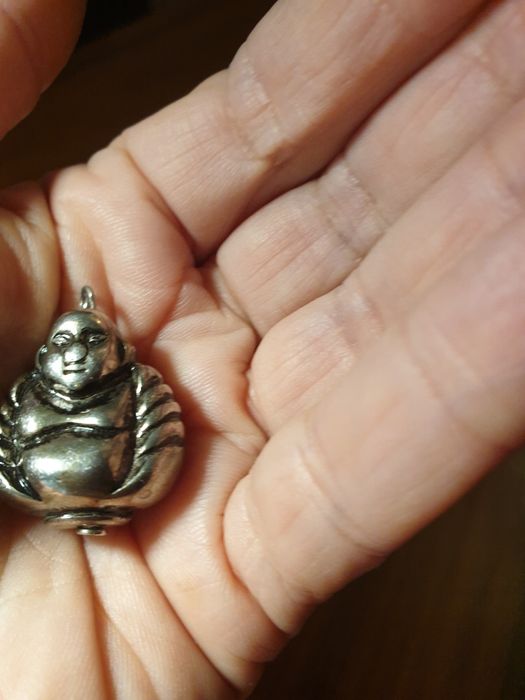 Amuletos antigos, usados em bom estado.