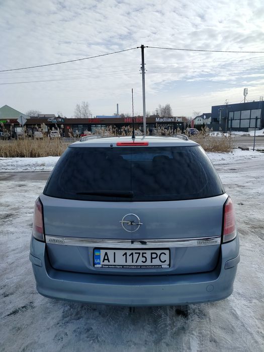 Астра H універсал 1.6.бензин