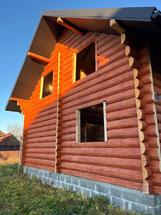 Продам дерев'яний будинок з земельною ділянкою