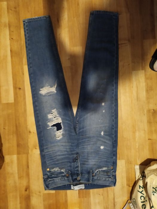 Spodnie dżinsy jeansy z dziurami Boyfriend