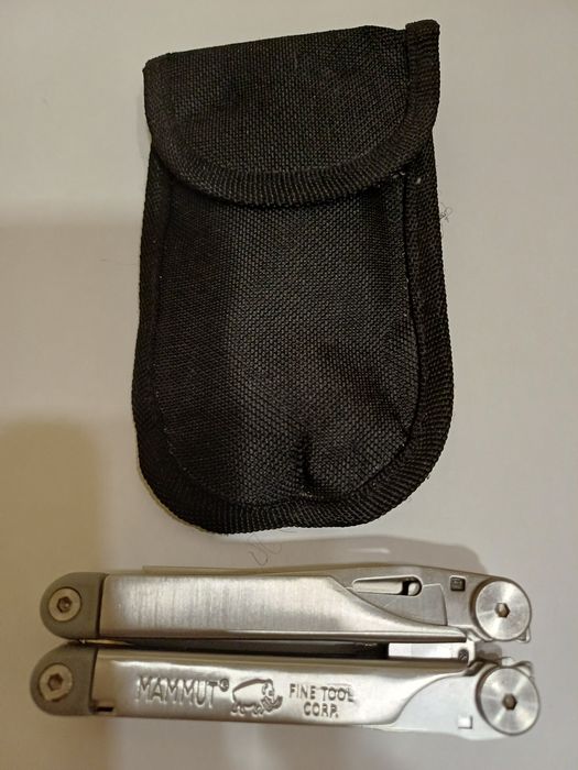 Многофункциональный  складной инструмент.