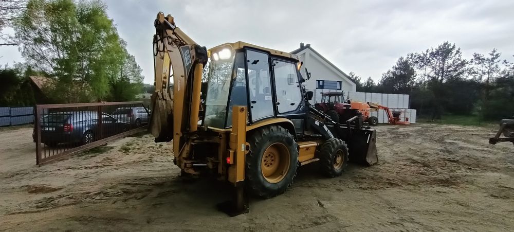 koparko ładowarka CAT 428c widły teleskop krokodyl 4x4 manual