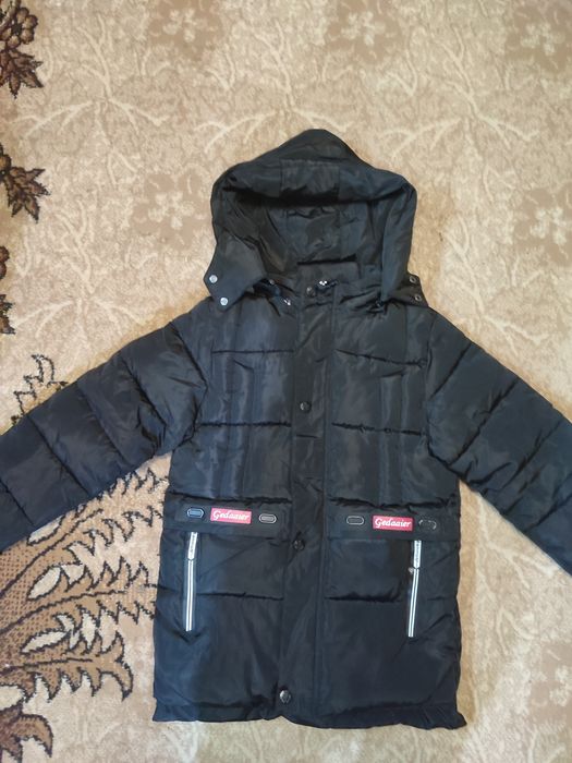 Пуховик зимний .