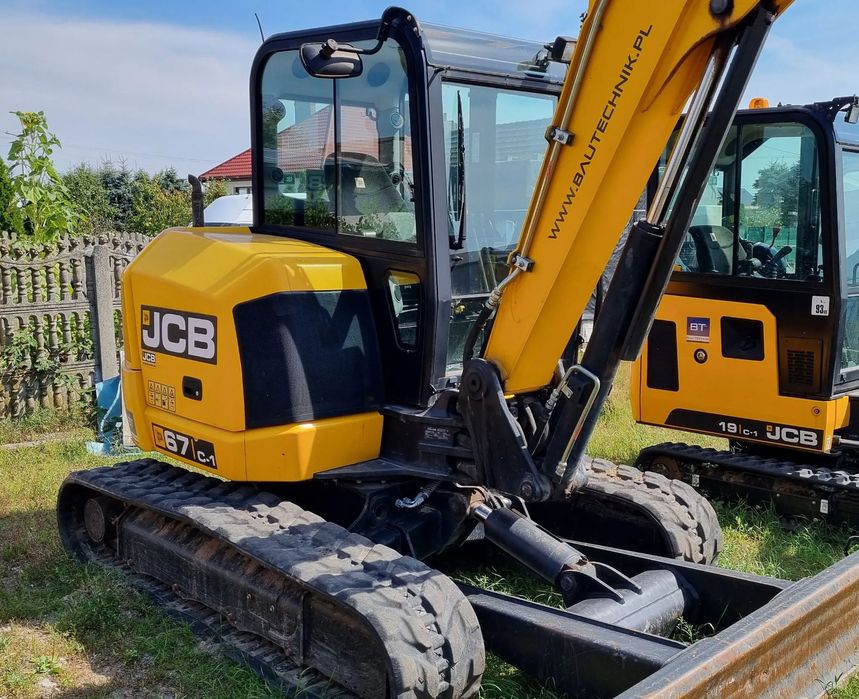JCB 67C-1  Midikoparka JCB 67C-1 z dodatkowymi łyżkami