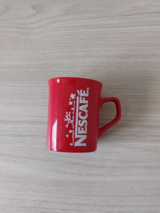 Kubek  NESCAFE 1/4 litra.