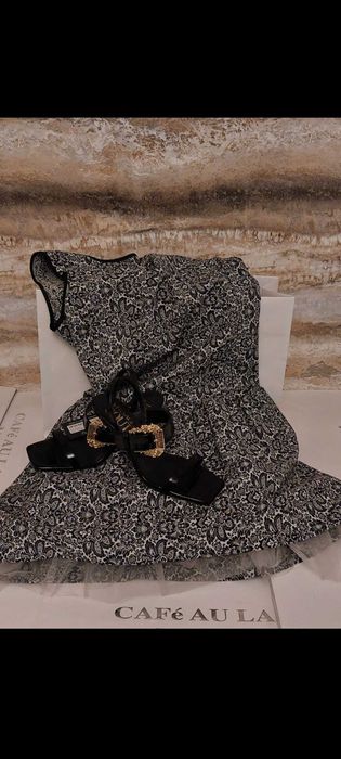 Efektowna sukienka typu bombka na usztywnionej halce Marki Imperial