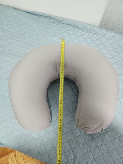 Almofada de amamentação como nova