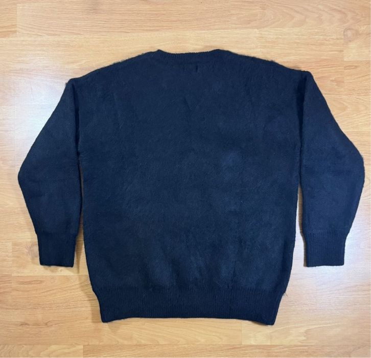 Camisola Saint Laurent preta - estilo minimalista e elegante