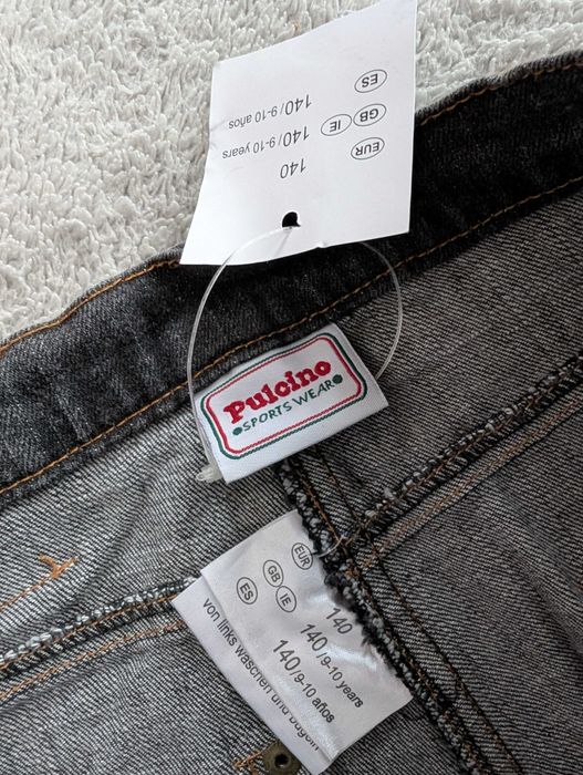 Nowe szare spodnie jeansowe jeansy z ćwiekami dżetami Pulcino 140
