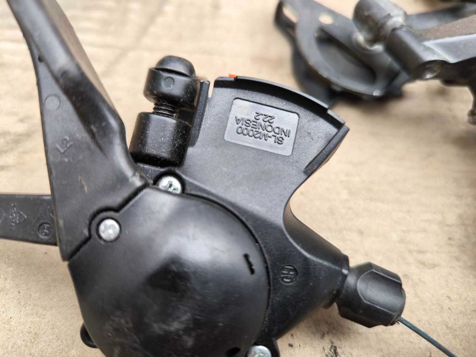 Переключатель скоростей Shimano Acera, Altus, Cues