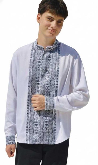 Сукня корсетна на білій основі. Червоний, синій та чорний на білому.