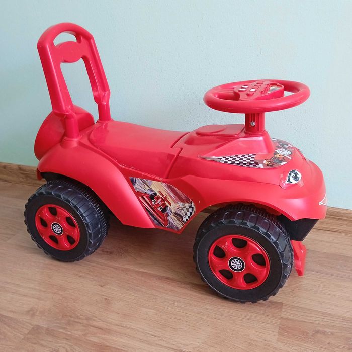 Машинка каталка дитяча