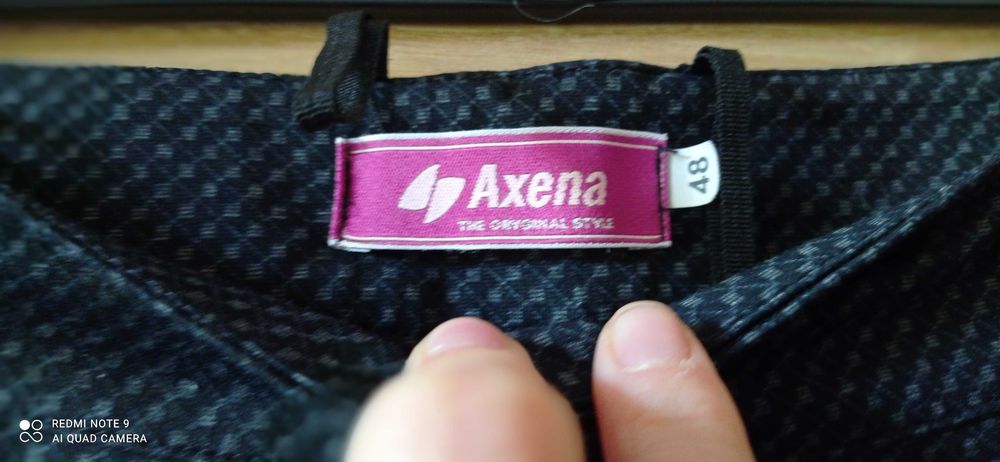 Piękne eleganckie spodnie materiałowe 48 AXENA