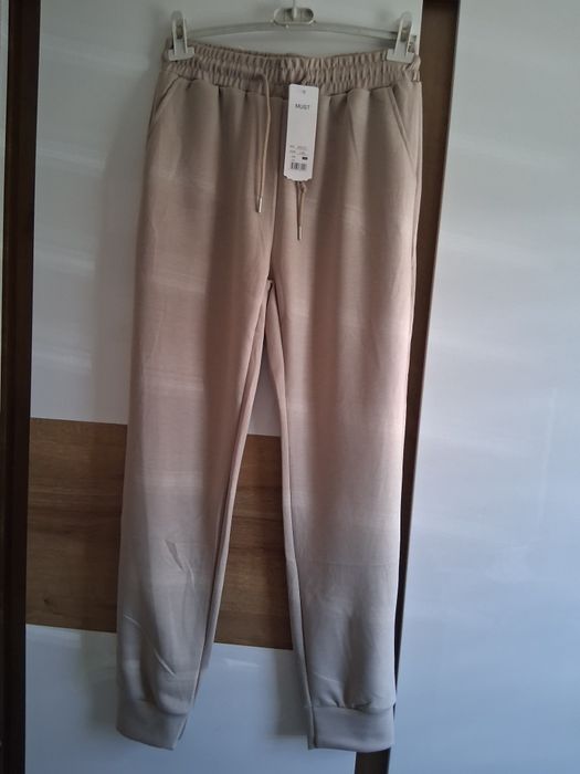 Spodnie dresowe  beżowe L/XL okazja