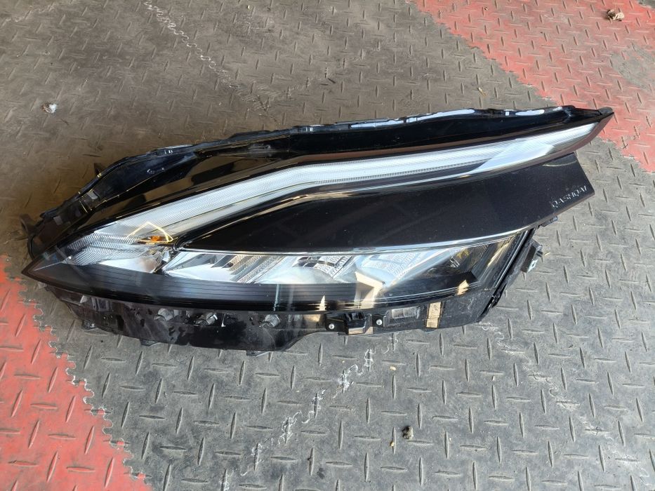 Lampa przednia lewa Nissan Qashqai  J12, 100-8D02G
