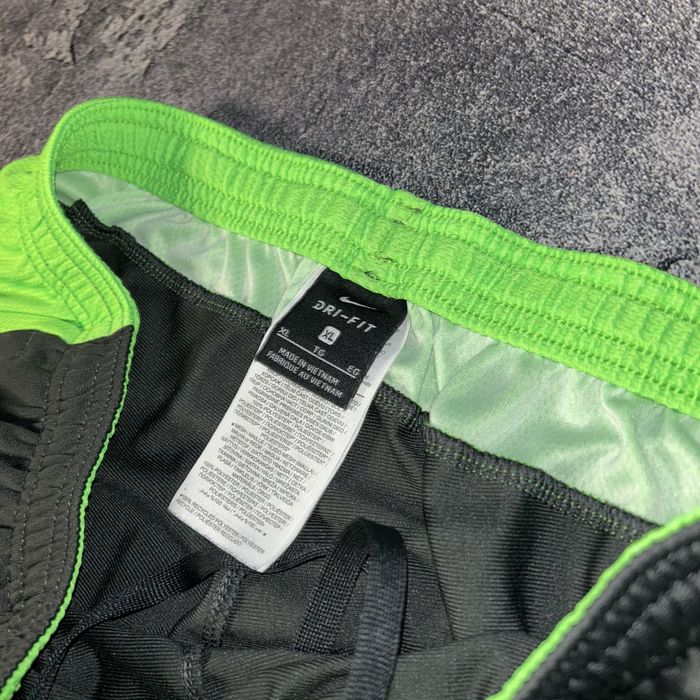 Спортивні штани Nike XL оригінал  з салатовими вставками