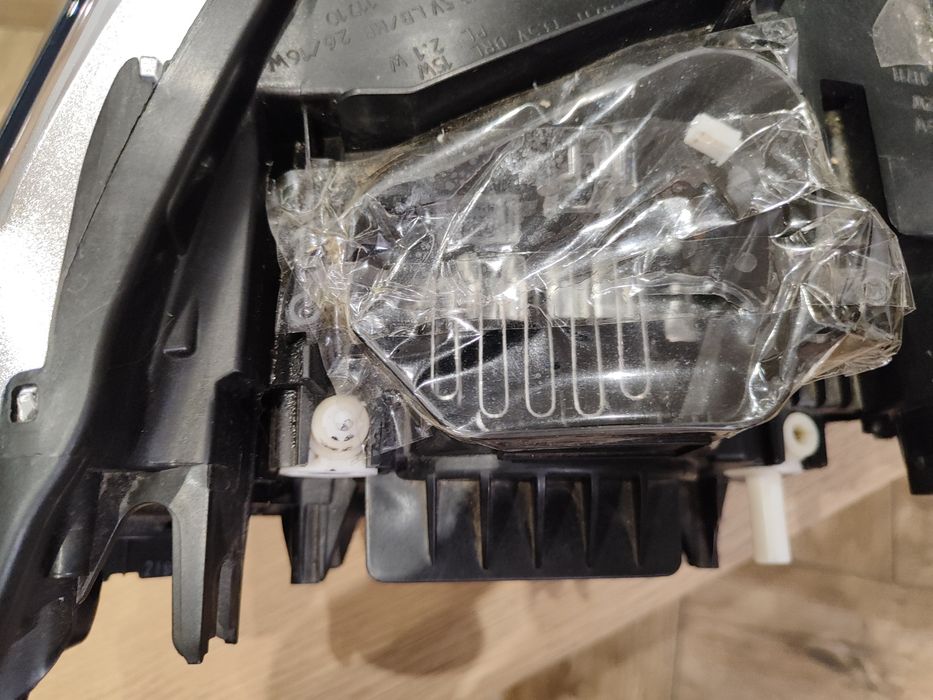 Reflektor LED lewy BMW X1 F48 przedlift USA radiator