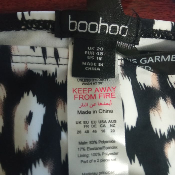 Новий купальник леопардовий , розмір 60-62