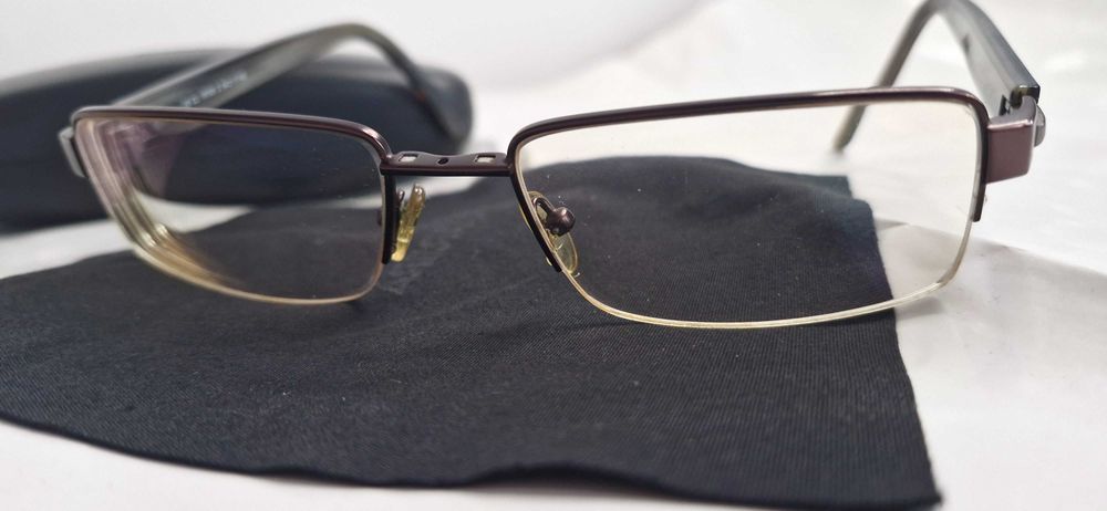 Sprzedam okulary męskie prostokątne Carrera w brązowych oprawkach.