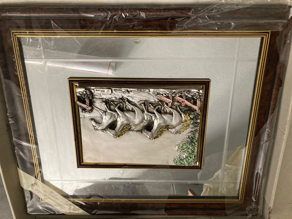 Quadro em espelho e com relevo
