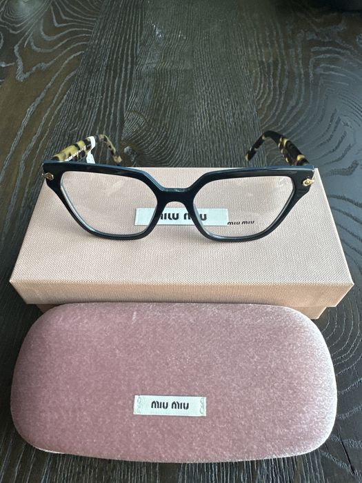 Okulary korekcyjne marki Miu Miu MU 02TV TMY-101