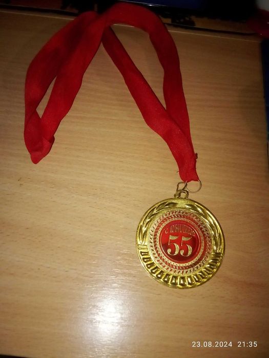 Продам подарочную медаль